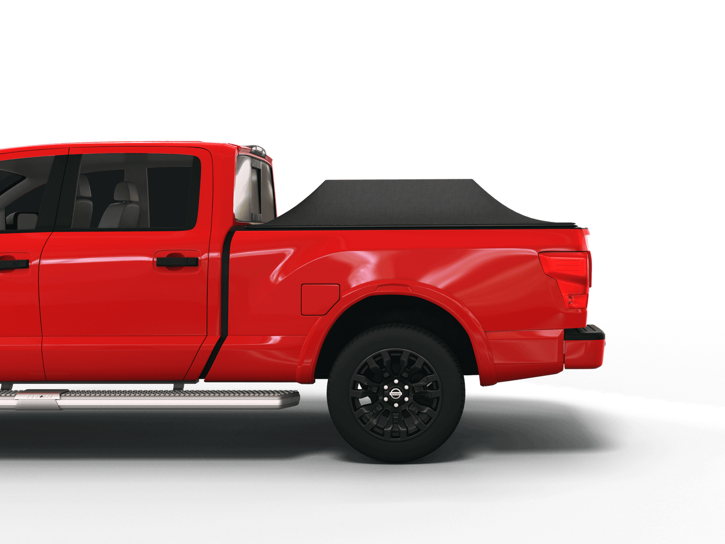 Red Nissan Titan with Sawtooth Stretch tonneau cover expanded over cargo load